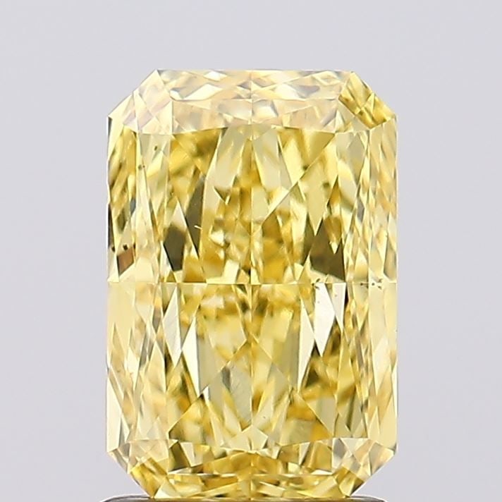 Loose Diamond - RADIANT 1.53ct Fancy Vivid Yellow VS1: Loose Diamond - RADIANT 1.53ct Fancy Vivid Yellow VS1 Source: This is a real non-mined Diamond that has been grown in a lab Shape: RADIANT Carats: 1.53 Color: Fancy Vivid Yellow Certification: IGI Vid