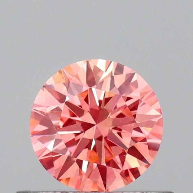 Loose Diamond - ROUND 0.49ct Fancy Vivid Pink VVS2: Loose Diamond - ROUND 0.49ct Fancy Vivid Pink VVS2 Source: This is a real non-mined Diamond that has been grown in a lab Shape: ROUND Carats: 0.49 Color: Fancy Vivid Pink Certification: IGI Video: