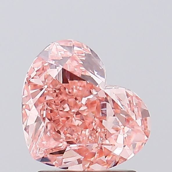 Loose Diamond - HEART 2.1ct Fancy Intense Pink VVS2: Loose Diamond - HEART 2.1ct Fancy Intense Pink VVS2 Source: This is a real non-mined Diamond that has been grown in a lab Shape: HEART Carats: 2.1 Color: Fancy Intense Pink Certification: IGI Video: