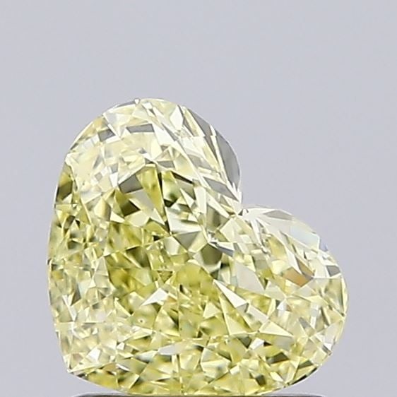 Loose Diamond - HEART 0.93ct Fancy Yellow VS1: Loose Diamond - HEART 0.93ct Fancy Yellow VS1 Source: This is a real non-mined Diamond that has been grown in a lab Shape: HEART Carats: 0.93 Color: Fancy Yellow Certification: IGI Video: