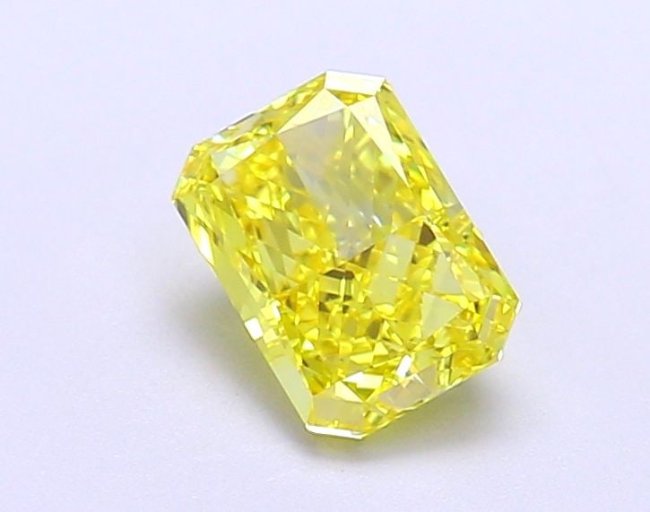 Loose Diamond - RADIANT 1.03ct Fancy Vivid Yellow IF: Loose Diamond - RADIANT 1.03ct Fancy Vivid Yellow IF Source: This is a real non-mined Diamond that has been grown in a lab Shape: RADIANT Carats: 1.03 Color: Fancy Vivid Yellow Certification: IGI Vide