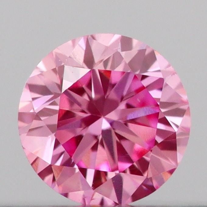 Loose Diamond - ROUND 0.14ct Fancy Vivid Pink VS1: Loose Diamond - ROUND 0.14ct Fancy Vivid Pink VS1 Source: This is a real non-mined Diamond that has been grown in a lab Shape: ROUND Carats: 0.14 Color: Fancy Vivid Pink Certification: IGI Video: