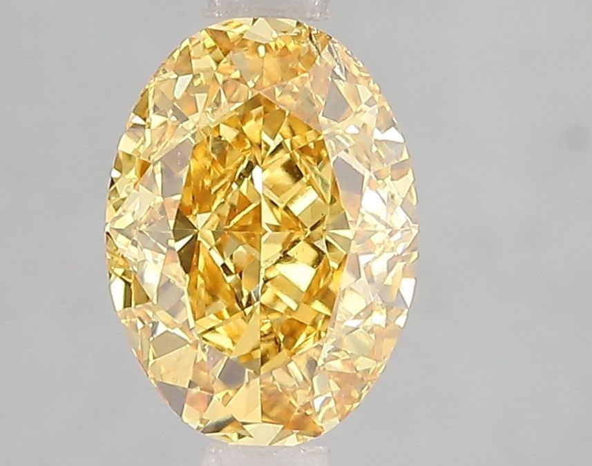 Loose Diamond - OVAL 2.05ct Fancy Vivid Yellow SI1: Loose Diamond - OVAL 2.05ct Fancy Vivid Yellow SI1 Source: This is a real non-mined Diamond that has been grown in a lab Shape: OVAL Carats: 2.05 Color: Fancy Vivid Yellow Certification: IGI Video:
