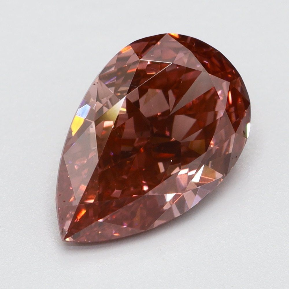 Loose Diamond - PEAR 1.36ct Fancy Vivid Purplish Pink VS1: Loose Diamond - PEAR 1.36ct Fancy Vivid Purplish Pink VS1 Source: This is a real non-mined Diamond that has been grown in a lab Shape: PEAR Carats: 1.36 Color: Fancy Vivid Purplish Pink Certification: