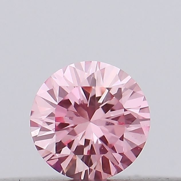 Loose Diamond - ROUND 0.11ct Fancy Vivid Pink VS1: Loose Diamond - ROUND 0.11ct Fancy Vivid Pink VS1 Source: This is a real non-mined Diamond that has been grown in a lab Shape: ROUND Carats: 0.11 Color: Fancy Vivid Pink Certification: IGI Video: