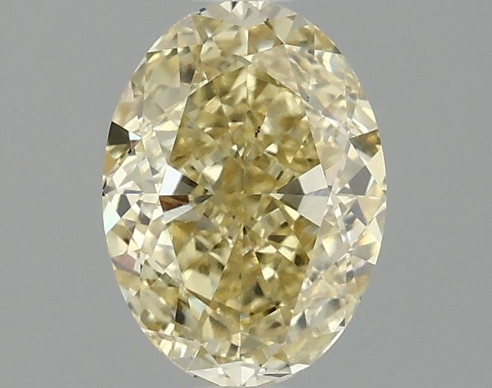 Loose Diamond - OVAL 1.59ct Fancy Vivid Yellow VS2: Loose Diamond - OVAL 1.59ct Fancy Vivid Yellow VS2 Source: This is a real non-mined Diamond that has been grown in a lab Shape: OVAL Carats: 1.59 Color: Fancy Vivid Yellow Certification: IGI Video: