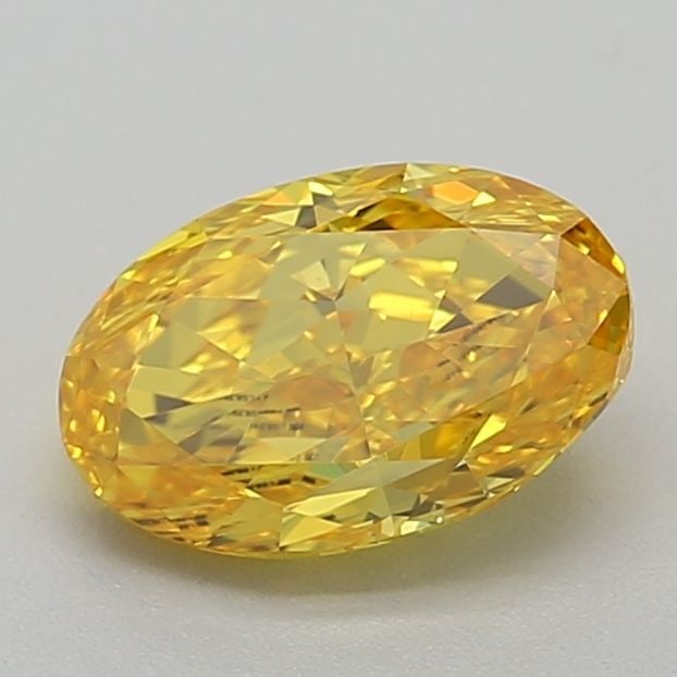 Loose Diamond - OVAL 0.71ct Fancy Vivid Yellow VVS2: Loose Diamond - OVAL 0.71ct Fancy Vivid Yellow VVS2 Source: This is a real non-mined Diamond that has been grown in a lab Shape: OVAL Carats: 0.71 Color: Fancy Vivid Yellow Certification: IGI Video: