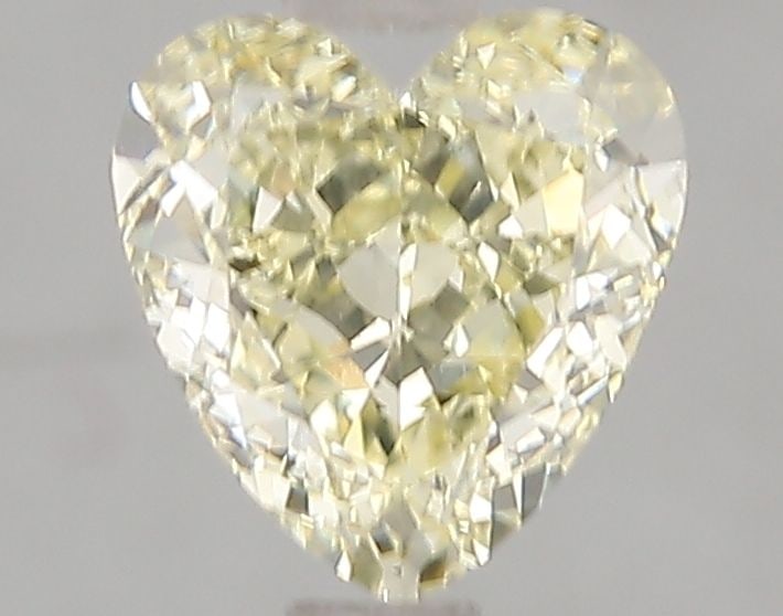 Loose Diamond - HEART 2.01ct Fancy Yellow VS1: Loose Diamond - HEART 2.01ct Fancy Yellow VS1 Source: This is a real non-mined Diamond that has been grown in a lab Shape: HEART Carats: 2.01 Color: Fancy Yellow Certification: IGI Video: