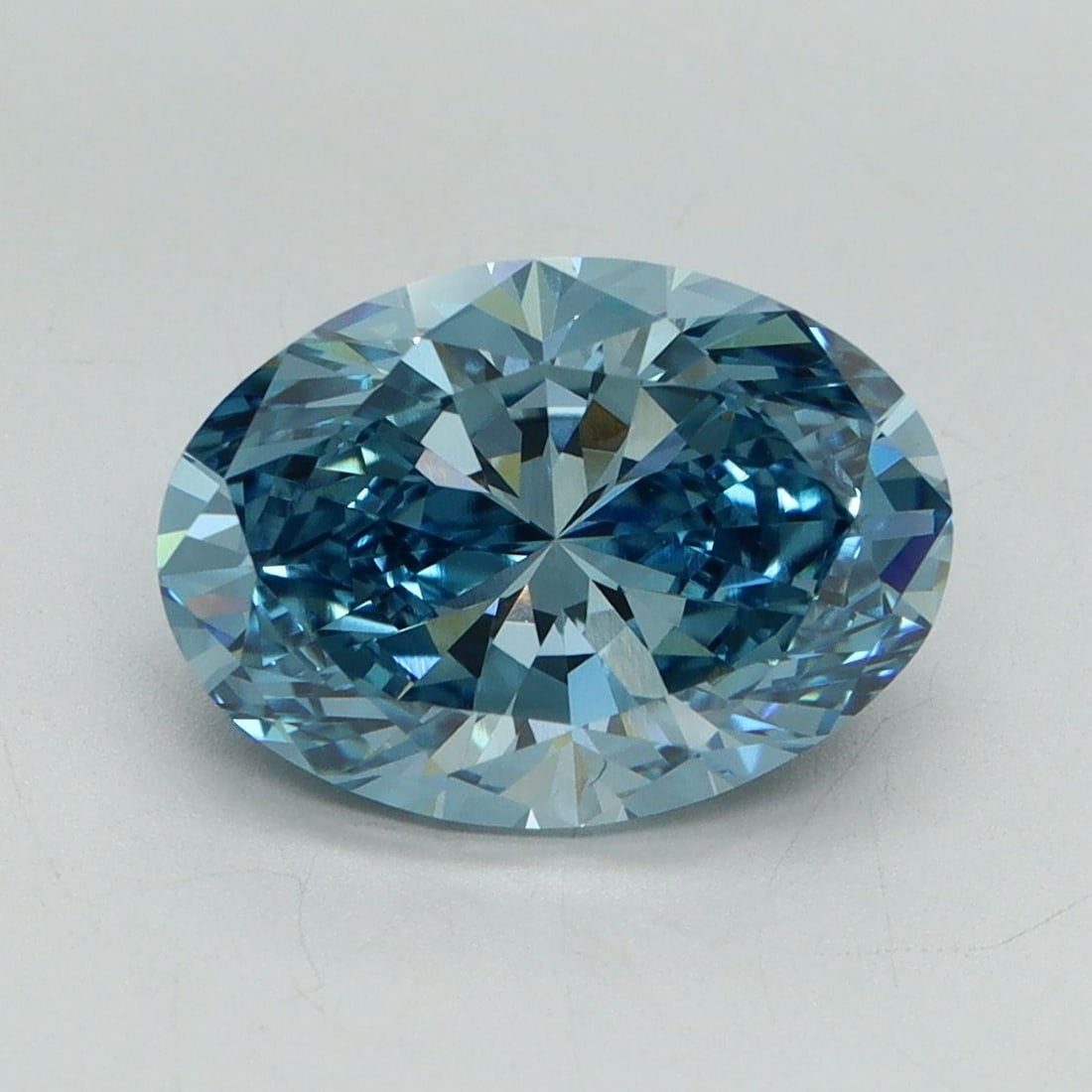 Loose Diamond - OVAL 3.04ct Fancy Vivid Blue VVS2: Loose Diamond - OVAL 3.04ct Fancy Vivid Blue VVS2 Source: This is a real non-mined Diamond that has been grown in a lab Shape: OVAL Carats: 3.04 Color: Fancy Vivid Blue Certification: IGI Video: