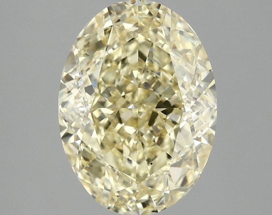 Loose Diamond - OVAL 3.1ct Fancy Vivid Yellow VS2: Loose Diamond - OVAL 3.1ct Fancy Vivid Yellow VS2 Source: This is a real non-mined Diamond that has been grown in a lab Shape: OVAL Carats: 3.1 Color: Fancy Vivid Yellow Certification: IGI Video: