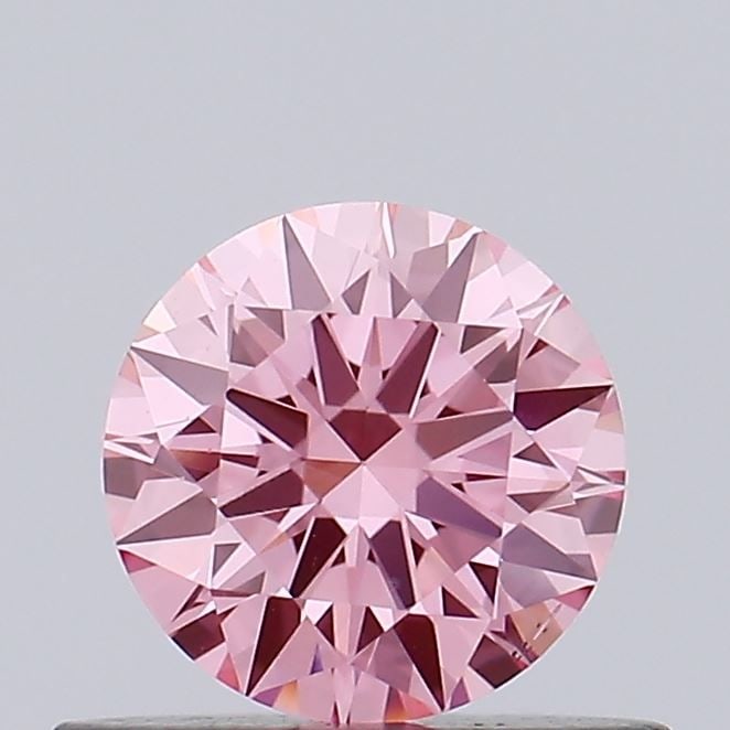 Ideal Loose Diamond - ROUND 0.44ct Fancy Vivid Pink VS2: Ideal Loose Diamond - ROUND 0.44ct Fancy Vivid Pink VS2 Source: This is a real non-mined Diamond that has been grown in a lab Shape: ROUND Carats: 0.44 Color: Fancy Vivid Pink Certification: IGI Video