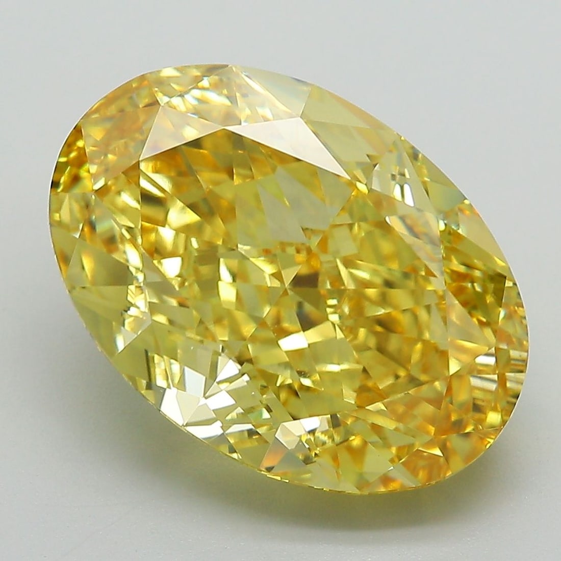 Loose Diamond - OVAL 8.65ct Fancy Vivid Yellow VVS2: Loose Diamond - OVAL 8.65ct Fancy Vivid Yellow VVS2 Source: This is a real non-mined Diamond that has been grown in a lab Shape: OVAL Carats: 8.65 Color: Fancy Vivid Yellow Certification: IGI Video: