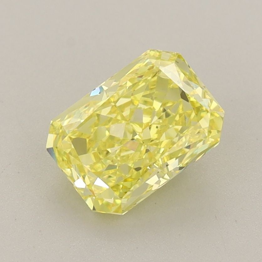 Loose Diamond - RADIANT 1.36ct Fancy Vivid Yellow VS1: Loose Diamond - RADIANT 1.36ct Fancy Vivid Yellow VS1 Source: This is a real non-mined Diamond that has been grown in a lab Shape: RADIANT Carats: 1.36 Color: Fancy Vivid Yellow Certification: IGI Vid