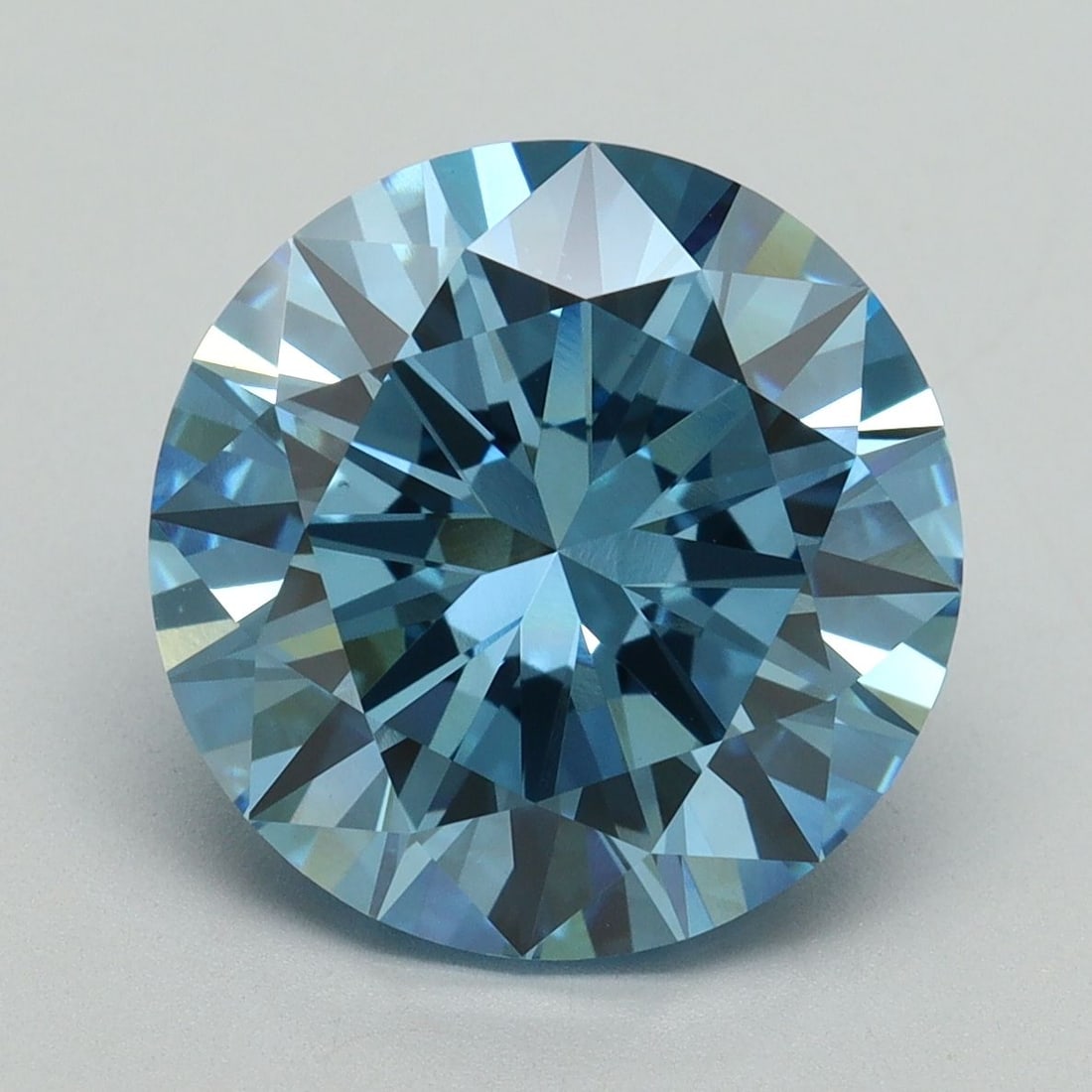 Loose Diamond - ROUND 6.08ct Fancy Vivid Blue VS1: Loose Diamond - ROUND 6.08ct Fancy Vivid Blue VS1 Source: This is a real non-mined Diamond that has been grown in a lab Shape: ROUND Carats: 6.08 Color: Fancy Vivid Blue Certification: IGI Video: