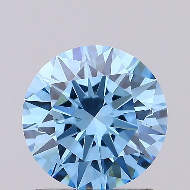 Loose Diamond - ROUND 1.25ct Fancy Vivid Blue VS2: Loose Diamond - ROUND 1.25ct Fancy Vivid Blue VS2 Source: This is a real non-mined Diamond that has been grown in a lab Shape: ROUND Carats: 1.25 Color: Fancy Vivid Blue Certification: IGI Video: