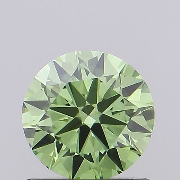 Loose Diamond - ROUND 0.94ct Fancy Vivid Green VS1: Loose Diamond - ROUND 0.94ct Fancy Vivid Green VS1 Source: This is a real non-mined Diamond that has been grown in a lab Shape: ROUND Carats: 0.94 Color: Fancy Vivid Green Certification: IGI Video: