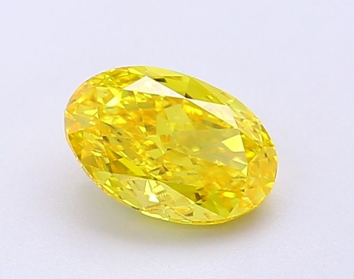 Loose Diamond - OVAL 1.12ct Fancy Vivid Yellow VVS2: Loose Diamond - OVAL 1.12ct Fancy Vivid Yellow VVS2 Source: This is a real non-mined Diamond that has been grown in a lab Shape: OVAL Carats: 1.12 Color: Fancy Vivid Yellow Certification: IGI Video: