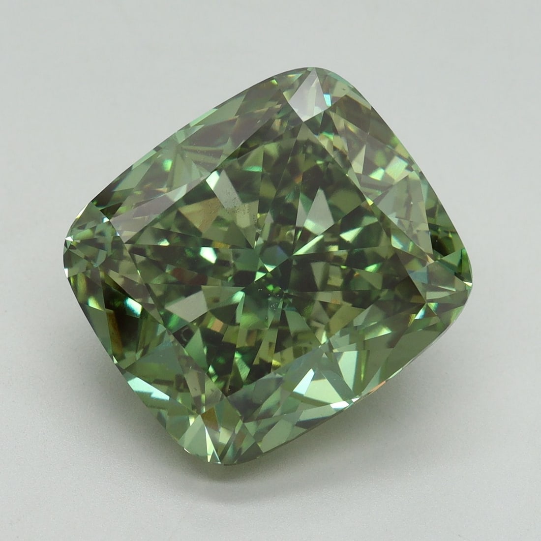 Loose Diamond - CUSHION MODIFIED 12.09ct Fancy Vivid Green VS2: Loose Diamond - CUSHION MODIFIED 12.09ct Fancy Vivid Green VS2 Source: This is a real non-mined Diamond that has been grown in a lab Shape: CUSHION MODIFIED Carats: 12.09 Color: Fancy Vivid Green Cert