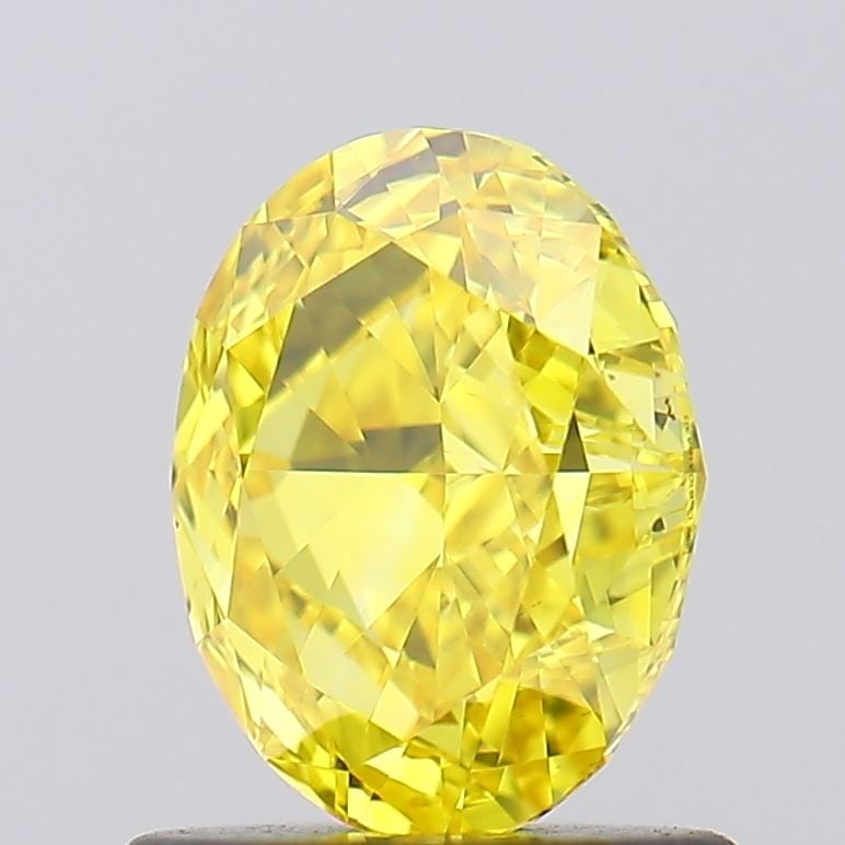 Loose Diamond - OVAL 1.02ct Fancy Vivid Yellow VVS2: Loose Diamond - OVAL 1.02ct Fancy Vivid Yellow VVS2 Source: This is a real non-mined Diamond that has been grown in a lab Shape: OVAL Carats: 1.02 Color: Fancy Vivid Yellow Certification: IGI Video: