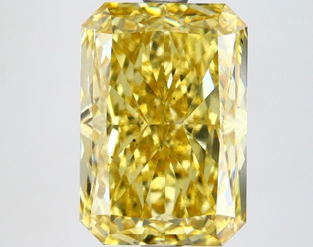 Loose Diamond - RADIANT 4.43ct Fancy Vivid Yellow VS2: Loose Diamond - RADIANT 4.43ct Fancy Vivid Yellow VS2 Source: This is a real non-mined Diamond that has been grown in a lab Shape: RADIANT Carats: 4.43 Color: Fancy Vivid Yellow Certification: IGI Vid