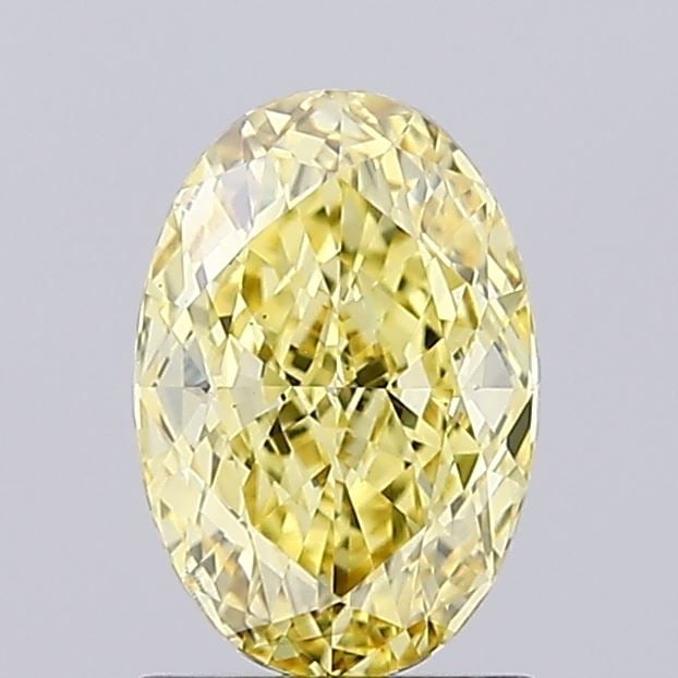 Loose Diamond - OVAL 1.2ct Fancy Vivid Yellow VS1: Loose Diamond - OVAL 1.2ct Fancy Vivid Yellow VS1 Source: This is a real non-mined Diamond that has been grown in a lab Shape: OVAL Carats: 1.2 Color: Fancy Vivid Yellow Certification: IGI Video: