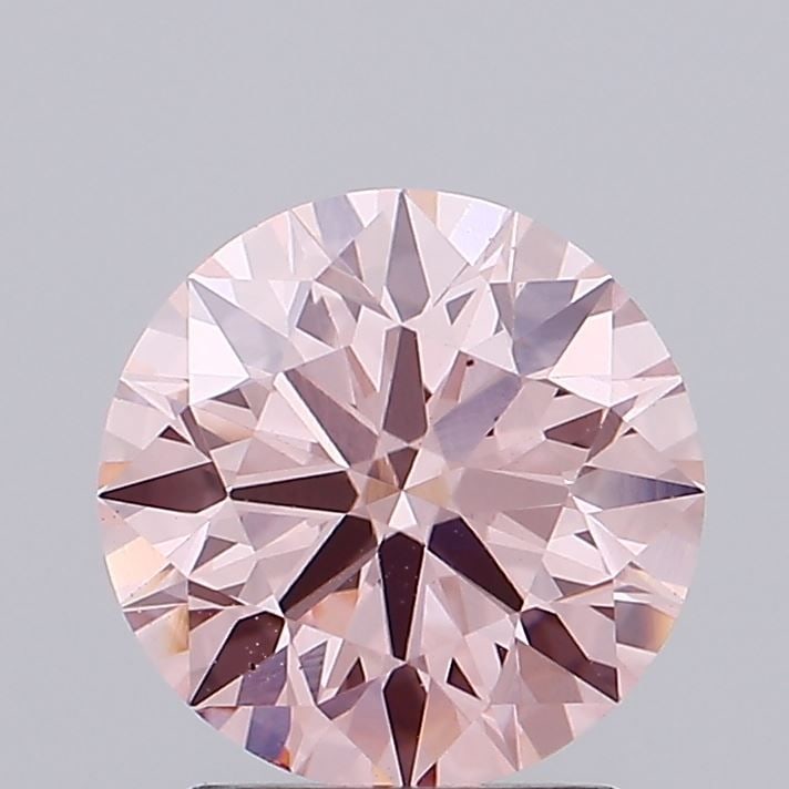 Ideal Loose Diamond - ROUND 1.84ct Fancy Vivid Pink VS2: Ideal Loose Diamond - ROUND 1.84ct Fancy Vivid Pink VS2 Source: This is a real non-mined Diamond that has been grown in a lab Shape: ROUND Carats: 1.84 Color: Fancy Vivid Pink Certification: IGI Video