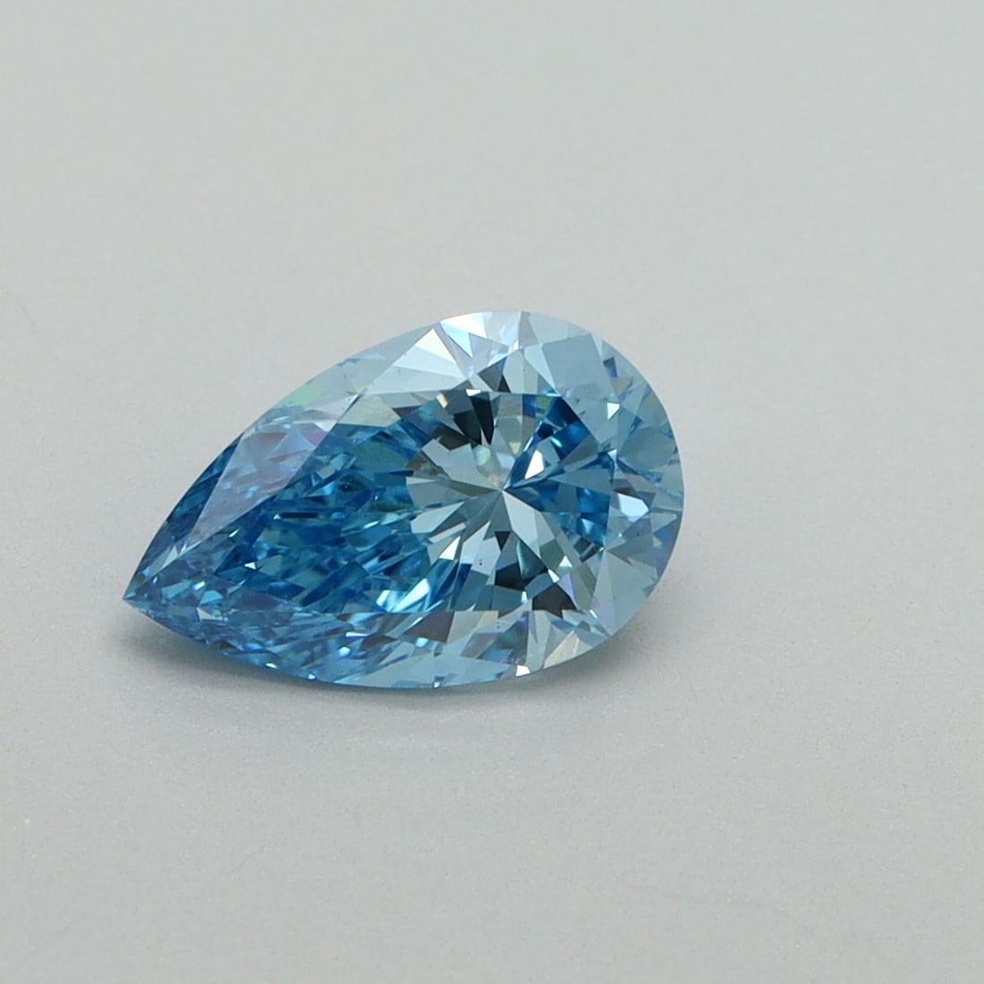 Loose Diamond - PEAR 1.01ct Fancy Vivid Blue VS1: Loose Diamond - PEAR 1.01ct Fancy Vivid Blue VS1 Source: This is a real non-mined Diamond that has been grown in a lab Shape: PEAR Carats: 1.01 Color: Fancy Vivid Blue Certification: IGI Video: