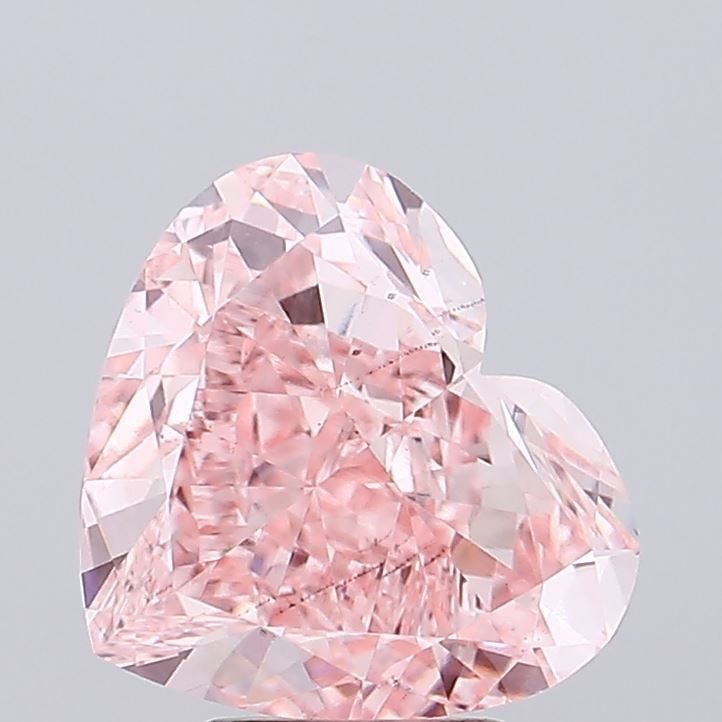 Loose Diamond - HEART 5.01ct Fancy Vivid Pink VS2: Loose Diamond - HEART 5.01ct Fancy Vivid Pink VS2 Source: This is a real non-mined Diamond that has been grown in a lab Shape: HEART Carats: 5.01 Color: Fancy Vivid Pink Certification: IGI Video: