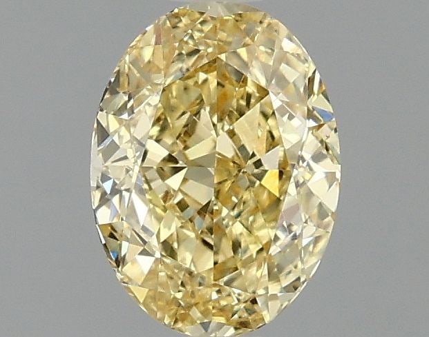 Loose Diamond - OVAL 1.09ct Fancy Vivid Yellow VS1: Loose Diamond - OVAL 1.09ct Fancy Vivid Yellow VS1 Source: This is a real non-mined Diamond that has been grown in a lab Shape: OVAL Carats: 1.09 Color: Fancy Vivid Yellow Certification: IGI Video:
