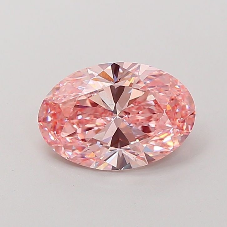 Loose Diamond - OVAL 2.03ct Fancy Vivid Pink VS2: Loose Diamond - OVAL 2.03ct Fancy Vivid Pink VS2 Source: This is a real non-mined Diamond that has been grown in a lab Shape: OVAL Carats: 2.03 Color: Fancy Vivid Pink Certification: IGI Video: