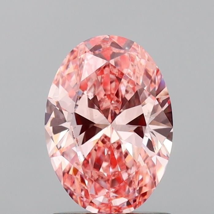 Loose Diamond - OVAL 1.2ct Fancy Vivid Pink VS2: Loose Diamond - OVAL 1.2ct Fancy Vivid Pink VS2 Source: This is a real non-mined Diamond that has been grown in a lab Shape: OVAL Carats: 1.2 Color: Fancy Vivid Pink Certification: IGI Video: