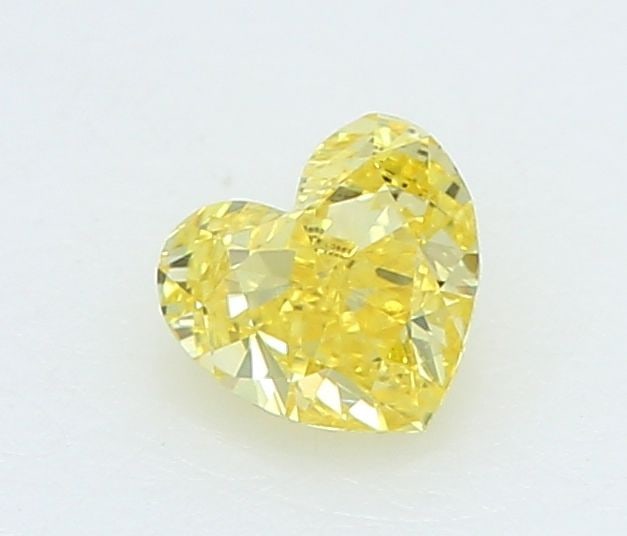Loose Diamond - HEART 0.2ct Fancy Vivid Yellow VVS2: Loose Diamond - HEART 0.2ct Fancy Vivid Yellow VVS2 Source: This is a real non-mined Diamond that has been grown in a lab Shape: HEART Carats: 0.2 Color: Fancy Vivid Yellow Certification: IGI Video: