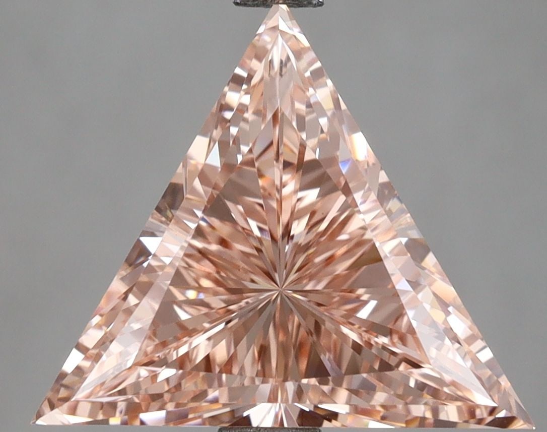 Loose Diamond - TRIANGULAR 2.88ct Fancy Vivid Pink VVS2: Loose Diamond - TRIANGULAR 2.88ct Fancy Vivid Pink VVS2 Source: This is a real non-mined Diamond that has been grown in a lab Shape: TRIANGULAR Carats: 2.88 Color: Fancy Vivid Pink Certification: IGI