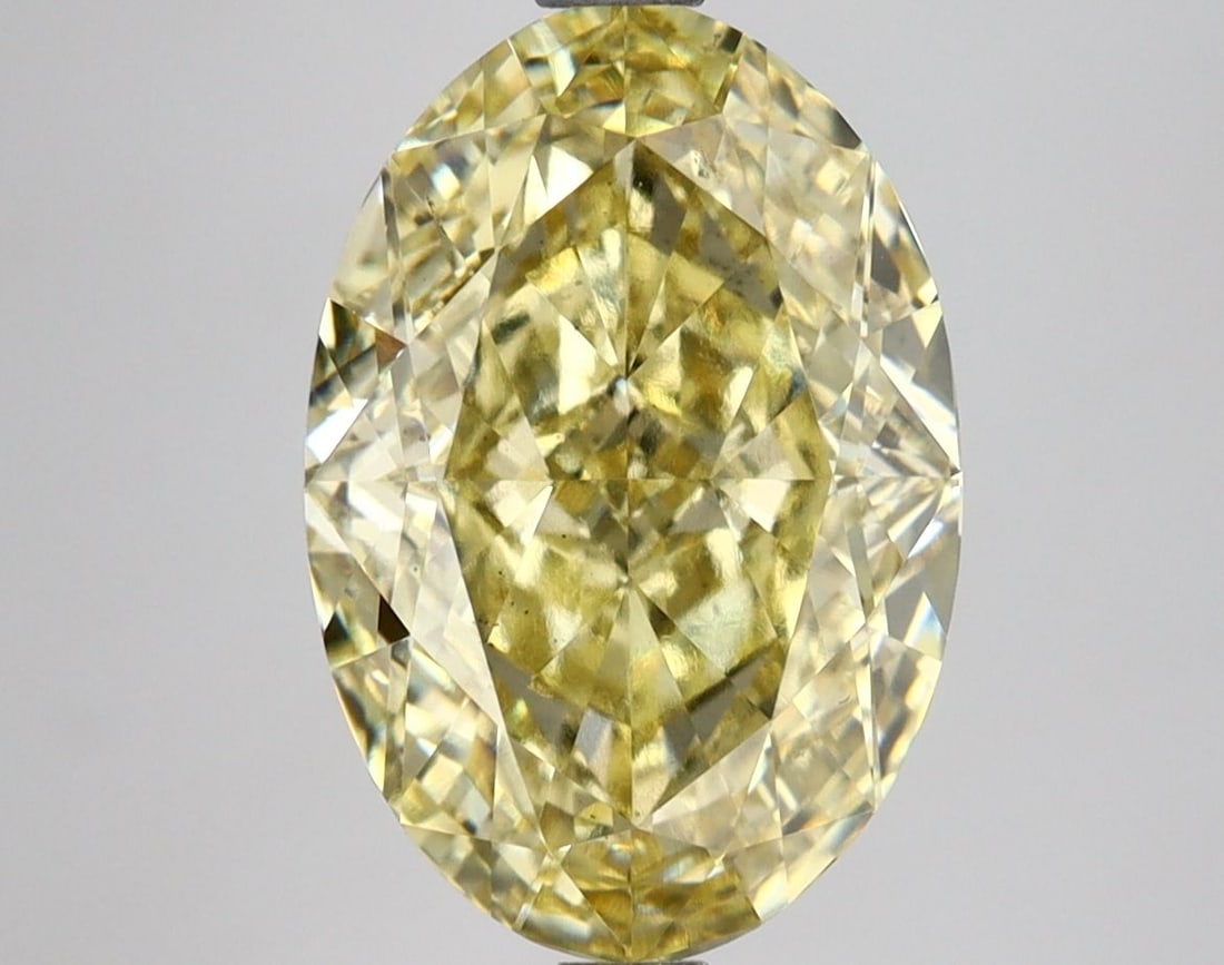 Loose Diamond - OVAL 4.58ct Fancy Vivid Yellow VS2: Loose Diamond - OVAL 4.58ct Fancy Vivid Yellow VS2 Source: This is a real non-mined Diamond that has been grown in a lab Shape: OVAL Carats: 4.58 Color: Fancy Vivid Yellow Certification: IGI Video: