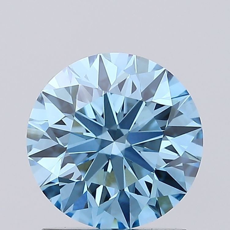 Loose Diamond - ROUND 1.36ct Fancy Vivid Blue VS1: Loose Diamond - ROUND 1.36ct Fancy Vivid Blue VS1 Source: This is a real non-mined Diamond that has been grown in a lab Shape: ROUND Carats: 1.36 Color: Fancy Vivid Blue Certification: IGI Video: