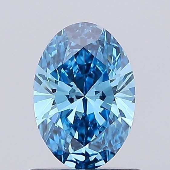 Loose Diamond - OVAL 0.71ct Fancy Vivid Blue VVS2: Loose Diamond - OVAL 0.71ct Fancy Vivid Blue VVS2 Source: This is a real non-mined Diamond that has been grown in a lab Shape: OVAL Carats: 0.71 Color: Fancy Vivid Blue Certification: IGI Video: