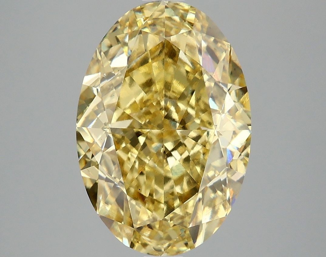 Loose Diamond - OVAL 5.08ct Fancy Vivid Yellow VS1: Loose Diamond - OVAL 5.08ct Fancy Vivid Yellow VS1 Source: This is a real non-mined Diamond that has been grown in a lab Shape: OVAL Carats: 5.08 Color: Fancy Vivid Yellow Certification: IGI Video:
