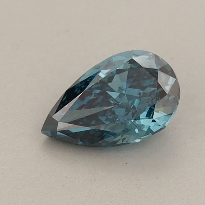 Loose Diamond - PEAR 0.59ct Fancy Vivid Blue VVS2: Loose Diamond - PEAR 0.59ct Fancy Vivid Blue VVS2 Source: This is a real non-mined Diamond that has been grown in a lab Shape: PEAR Carats: 0.59 Color: Fancy Vivid Blue Certification: IGI Video: