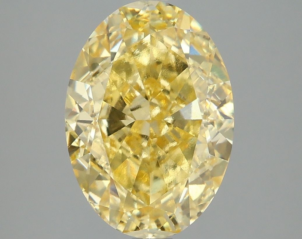 Loose Diamond - OVAL 5.01ct Fancy Vivid Yellow VS1: Loose Diamond - OVAL 5.01ct Fancy Vivid Yellow VS1 Source: This is a real non-mined Diamond that has been grown in a lab Shape: OVAL Carats: 5.01 Color: Fancy Vivid Yellow Certification: IGI Video: