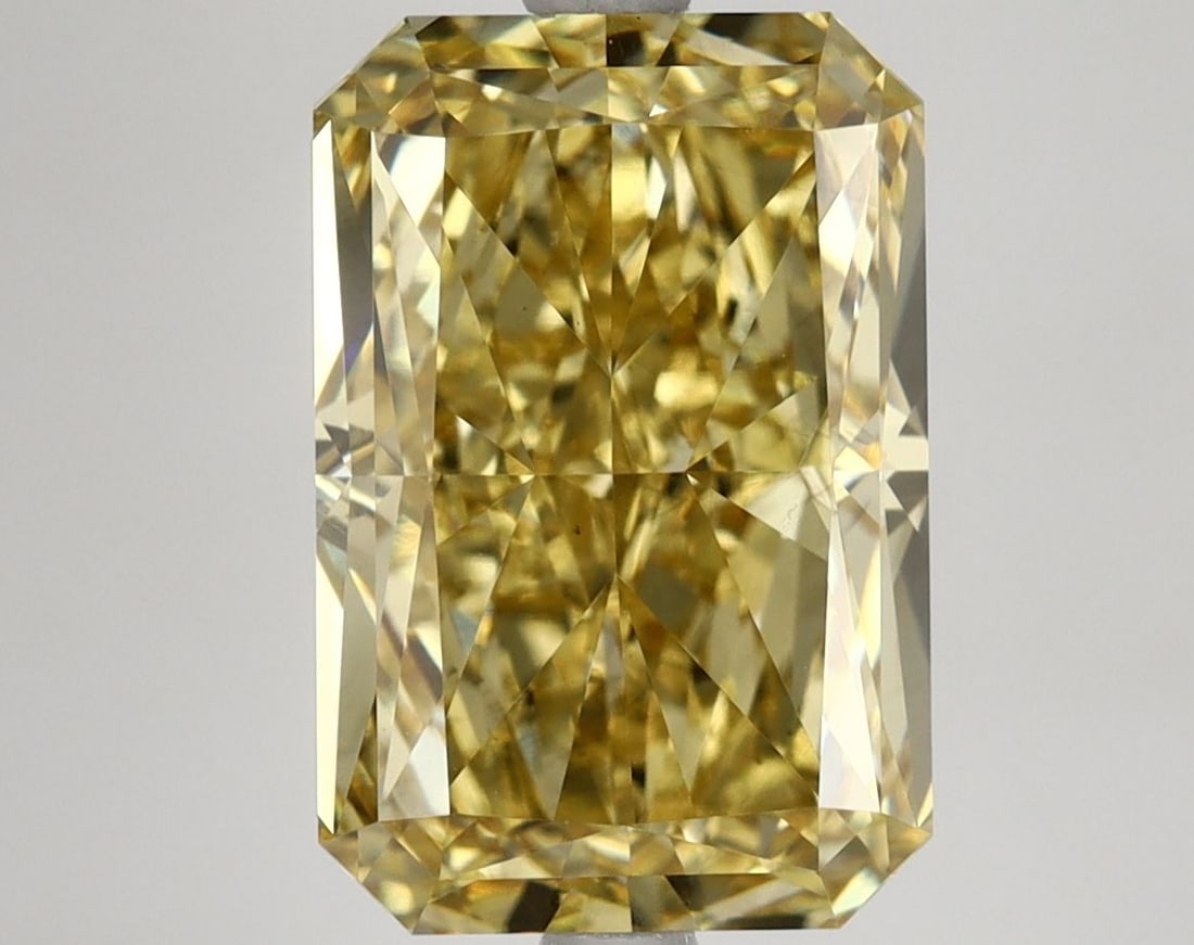 Loose Diamond - RADIANT 5.58ct Fancy Vivid Yellow VS1: Loose Diamond - RADIANT 5.58ct Fancy Vivid Yellow VS1 Source: This is a real non-mined Diamond that has been grown in a lab Shape: RADIANT Carats: 5.58 Color: Fancy Vivid Yellow Certification: IGI Vid