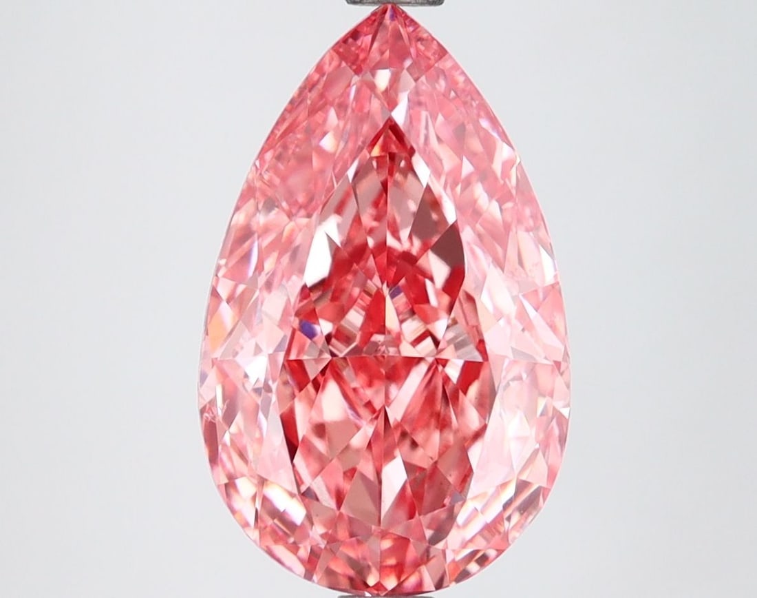 Loose Diamond - PEAR 3.23ct Fancy Vivid Pink VS1: Loose Diamond - PEAR 3.23ct Fancy Vivid Pink VS1 Source: This is a real non-mined Diamond that has been grown in a lab Shape: PEAR Carats: 3.23 Color: Fancy Vivid Pink Certification: IGI Video:
