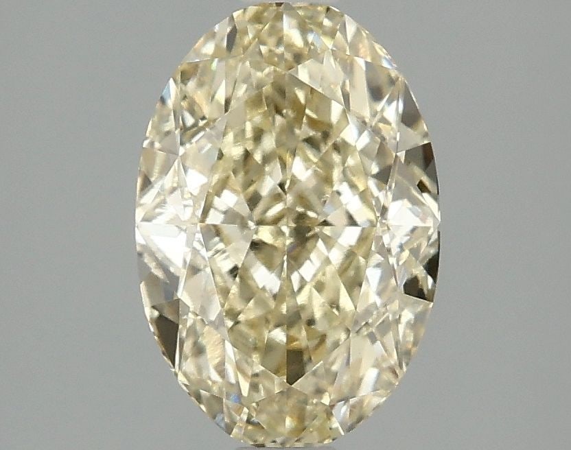 Loose Diamond - OVAL 2.1ct Fancy Yellow VVS2: Loose Diamond - OVAL 2.1ct Fancy Yellow VVS2 Source: This is a real non-mined Diamond that has been grown in a lab Shape: OVAL Carats: 2.1 Color: Fancy Yellow Certification: IGI Video: Video Link 