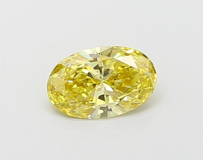 Loose Diamond - OVAL 0.5ct Fancy Vivid Yellow VS2: Loose Diamond - OVAL 0.5ct Fancy Vivid Yellow VS2 Source: This is a real non-mined Diamond that has been grown in a lab Shape: OVAL Carats: 0.5 Color: Fancy Vivid Yellow Certification: IGI Video:
