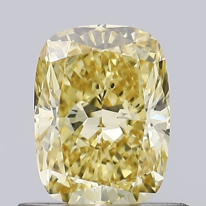Loose Diamond - CUSHION BRILLIANT 0.7ct Fancy Vivid Brownish Yellow VS2: Loose Diamond - CUSHION BRILLIANT 0.7ct Fancy Vivid Brownish Yellow VS2 Source: This is a real non-mined Diamond that has been grown in a lab Shape: CUSHION BRILLIANT Carats: 0.7 Color: Fancy Vivid Br