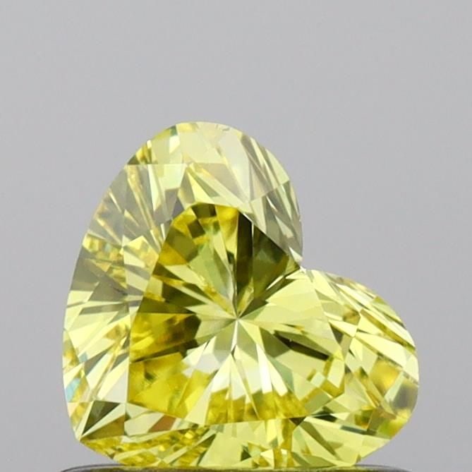 Loose Diamond - HEART 0.55ct Fancy Vivid Yellow VVS2: Loose Diamond - HEART 0.55ct Fancy Vivid Yellow VVS2 Source: This is a real non-mined Diamond that has been grown in a lab Shape: HEART Carats: 0.55 Color: Fancy Vivid Yellow Certification: IGI Video: