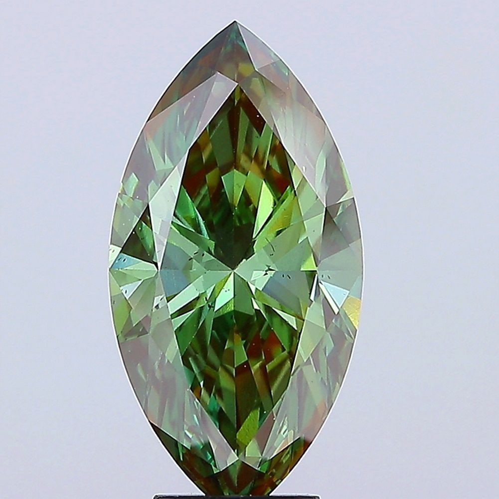 Loose Diamond - MARQUISE 5.04ct Fancy Deep Green VS2: Loose Diamond - MARQUISE 5.04ct Fancy Deep Green VS2 Source: This is a real non-mined Diamond that has been grown in a lab Shape: MARQUISE Carats: 5.04 Color: Fancy Deep Green Certification: IGI Video