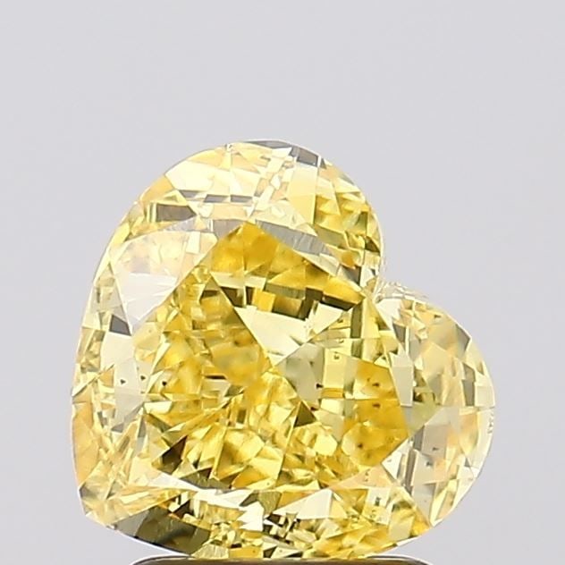 Loose Diamond - HEART 2.26ct Fancy Vivid Yellow VS2: Loose Diamond - HEART 2.26ct Fancy Vivid Yellow VS2 Source: This is a real non-mined Diamond that has been grown in a lab Shape: HEART Carats: 2.26 Color: Fancy Vivid Yellow Certification: IGI Video: