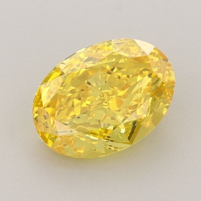 Loose Diamond - OVAL 1.1ct Fancy Vivid Yellow VS1: Loose Diamond - OVAL 1.1ct Fancy Vivid Yellow VS1 Source: This is a real non-mined Diamond that has been grown in a lab Shape: OVAL Carats: 1.1 Color: Fancy Vivid Yellow Certification: IGI Video: