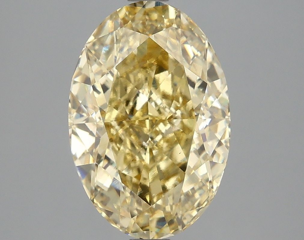 Loose Diamond - OVAL 4.03ct Fancy Intense Yellow VS1: Loose Diamond - OVAL 4.03ct Fancy Intense Yellow VS1 Source: This is a real non-mined Diamond that has been grown in a lab Shape: OVAL Carats: 4.03 Color: Fancy Intense Yellow Certification: IGI Video