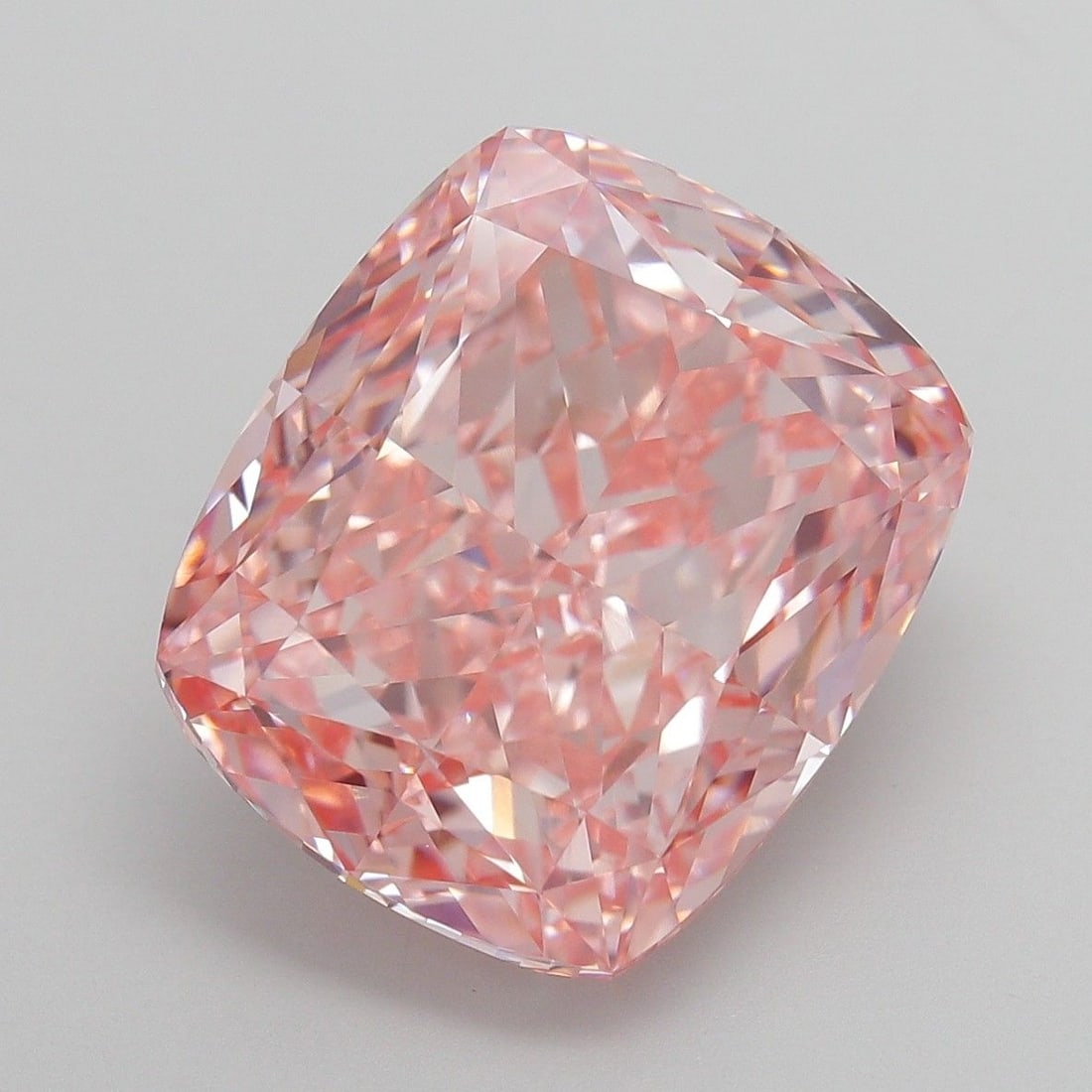 Loose Diamond - CUSHION MODIFIED 13.04ct Fancy Vivid Pink VVS2: Loose Diamond - CUSHION MODIFIED 13.04ct Fancy Vivid Pink VVS2 Source: This is a real non-mined Diamond that has been grown in a lab Shape: CUSHION MODIFIED Carats: 13.04 Color: Fancy Vivid Pink Certi